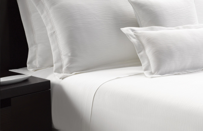 White hotel top sheet and pillows