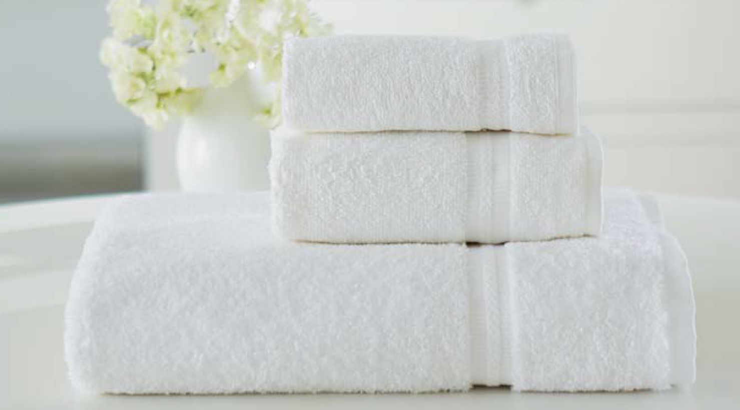 Three Welingham brand towels
